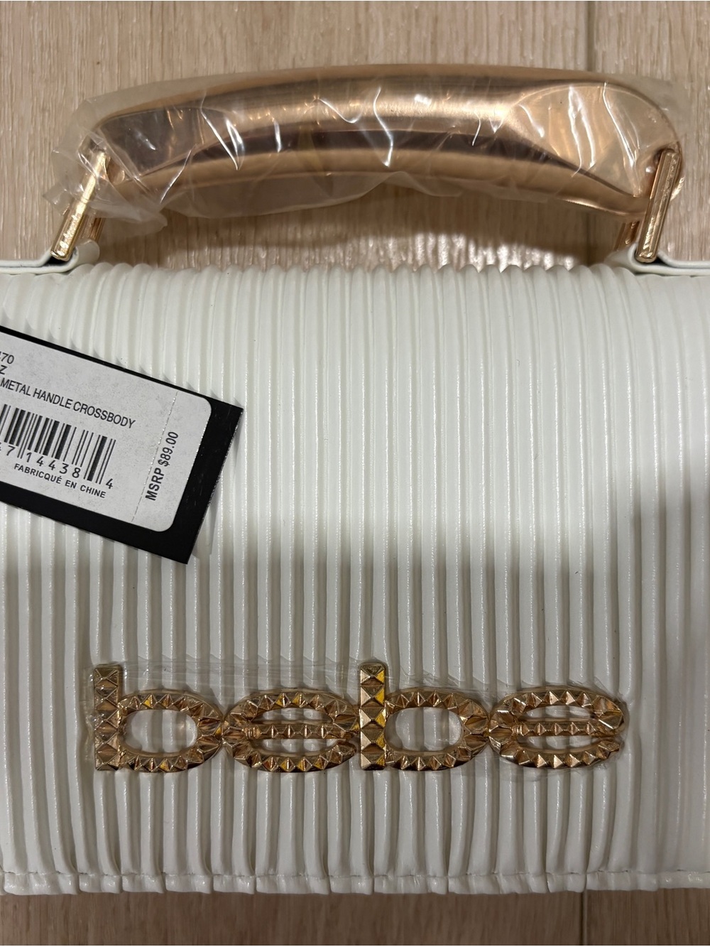 bebe White Pleated Crossbody with Gold Metal Handle and Logo